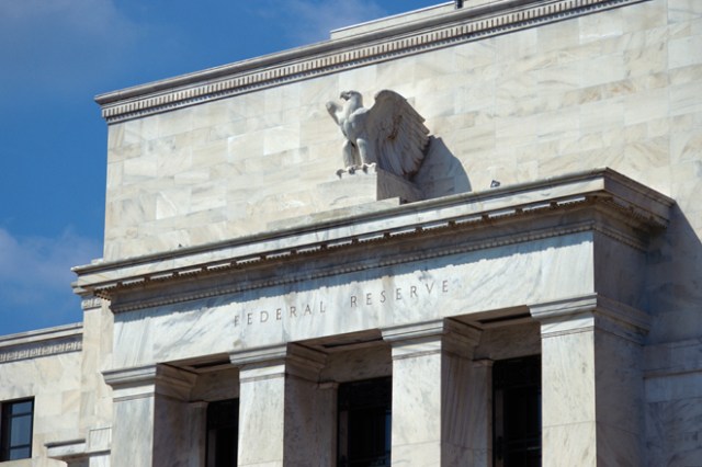 Federal Reserve building front eagle blue sky