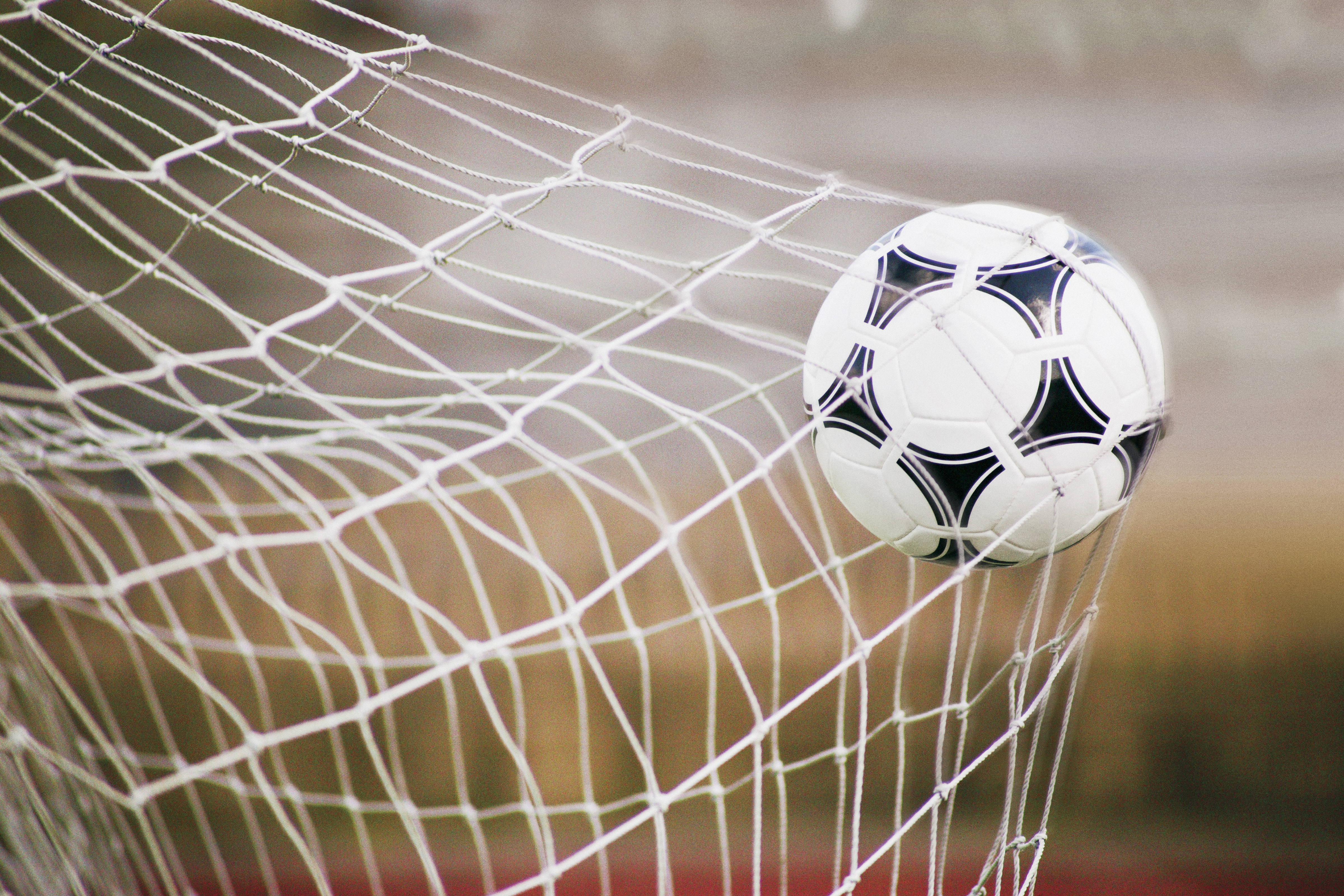 Football Trapped in a Goal Net, Close-Up