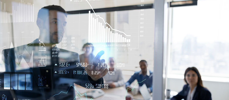 Man in meeting using touch screen